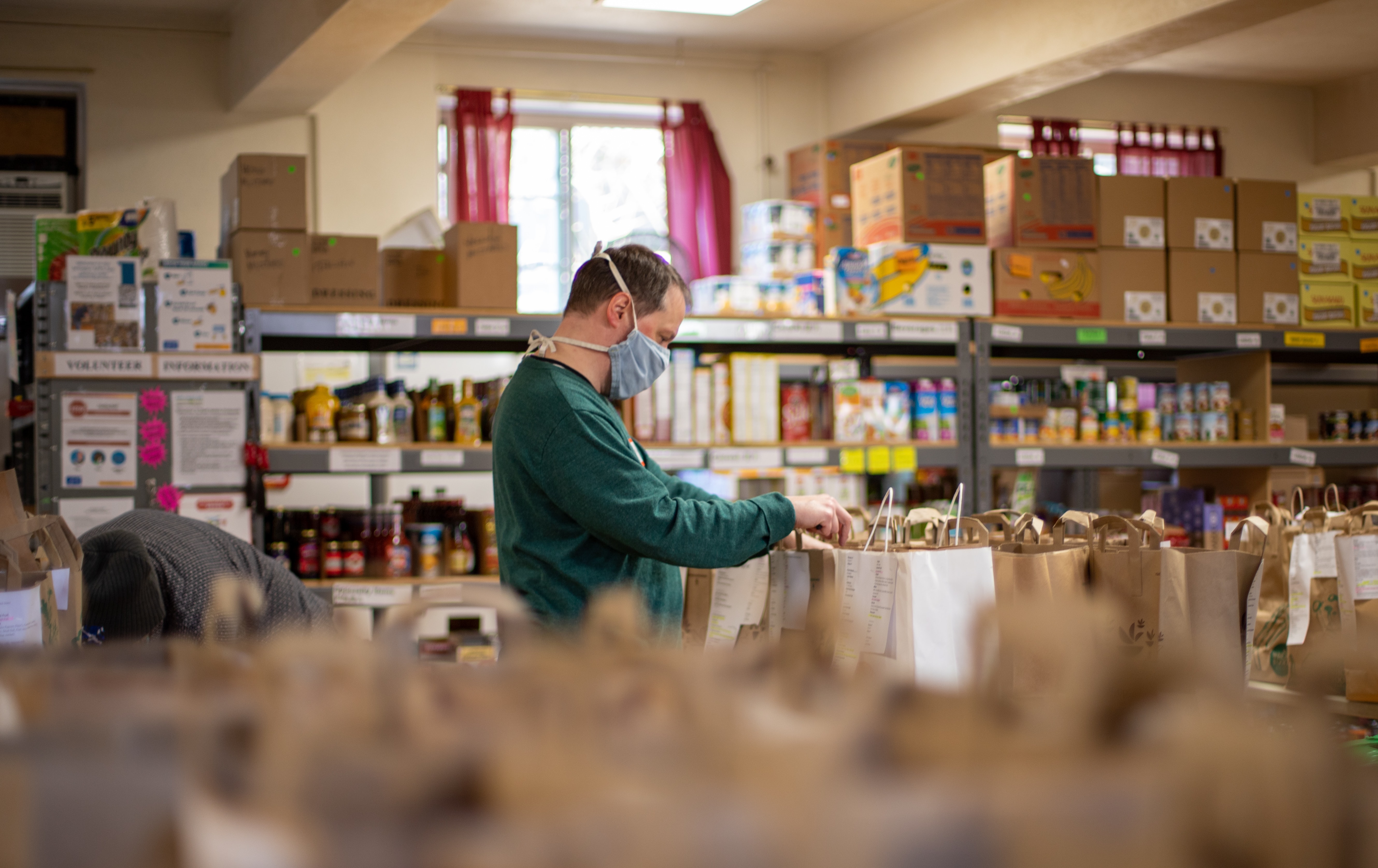 Picture of a person recieving food and drinks